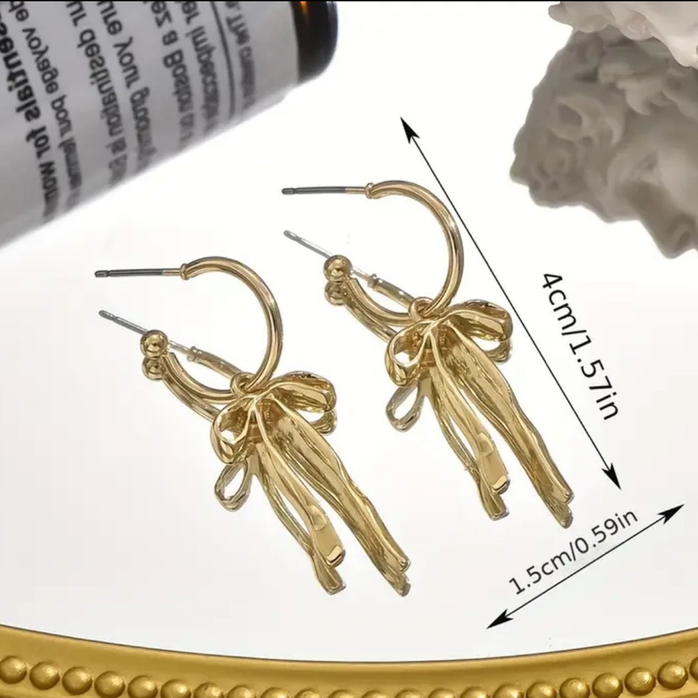 18k gold plated Elegant Gold Bow Earrings. 🔥